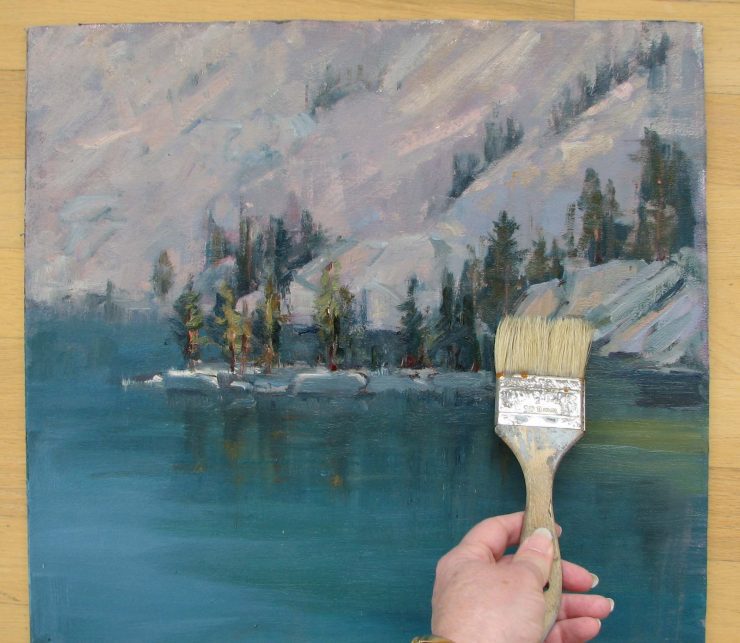 brush varnish down the painting